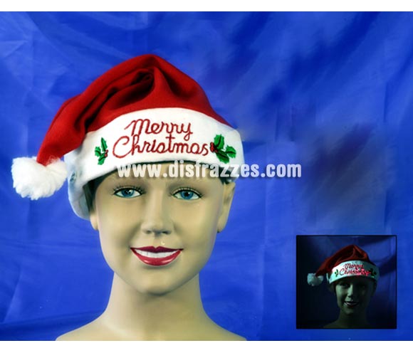 Sombrero o gorro de Papa Noel con luz de fibra óptica y música para Navidad. Pone Feliz Navidad, no Merry Christmas. ¡¡Compra los complementos de tus disfraces en nuestra tienda de disfraces, será divertido!!