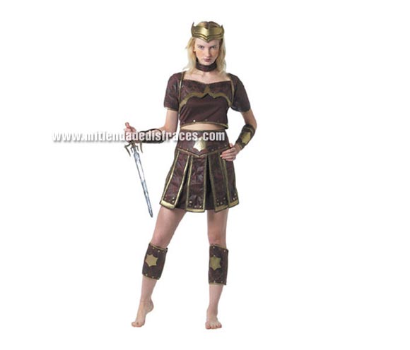 Disfraz de Guerrera adulta. Talla única 42/44. Incluye camisa, falda, muñequeras y espinilleras. Disfraz de Gladiadora.