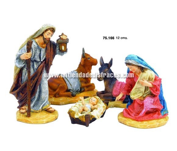 Nacimiento de 12 cms. compuesto por 5 figuras  de resina.