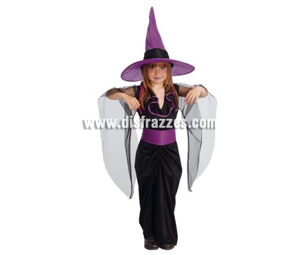 Disfraz de Bruja niña para Halloween negro y morado barato. Talla de 7 a 9 años. Incluye vestido y sombrero o gorro de Bruja. Éste disfraz está disponible en talla de adulta con las referencia 80144GUI para que las Mamás y las niñas vayan a juego. Éste disfraz de Halloween es ideal para celebrar la Fiesta de la Noche de las Brujas cada vez más arraigada en nuestro País en Pub's, Discotecas, Casas particulares,  Restaurantes o Colegios y ayudar a crear un ambiente terrorífico y tenebroso indispensable para la Noche de Halloween la cual se celebra la víspera de Todos los Santos.
¡¡Cómpranos tu disfraz para Halloween, será divertido!!