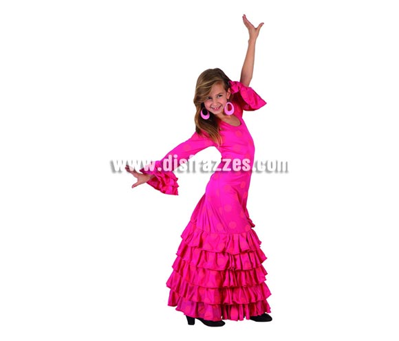 Disfraz de Sevillana Fucsia con lunar rosa para niñas de 10-12 años. Incluye vestido y flor de la cabeza. Pendientes NO incluidos, podrás verlos en la sección de Complementos.
