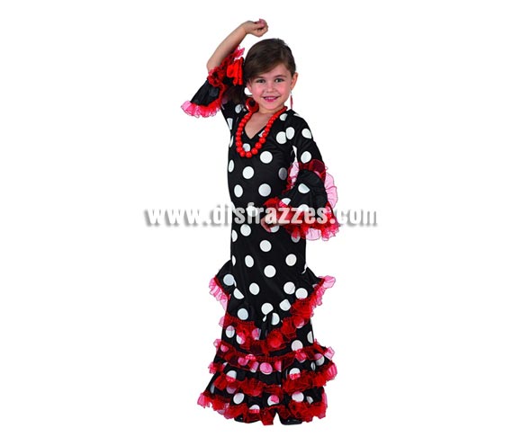 Disfraz de Sevillana Negro con lunar
blanco para niñas de 7 a 9 años. Incluye vestido y flor de la cabeza. Pendientes y Collar NO incluidos, podrás verlos en la sección de Complementos.